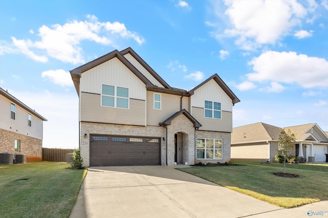 view of front facade featuring a front yard, central AC unit, and a garage