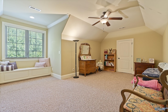 sitting room featuring visible vents, carpet flooring, a ceiling fan, and ornamental molding