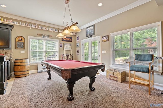 rec room with crown molding, billiards, light carpet, and a wealth of natural light