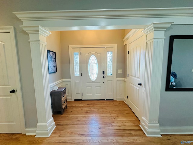 foyer with light hardwood / wood-style floors