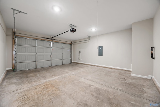 garage featuring electric panel and a garage door opener