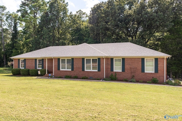 single story home featuring a front yard