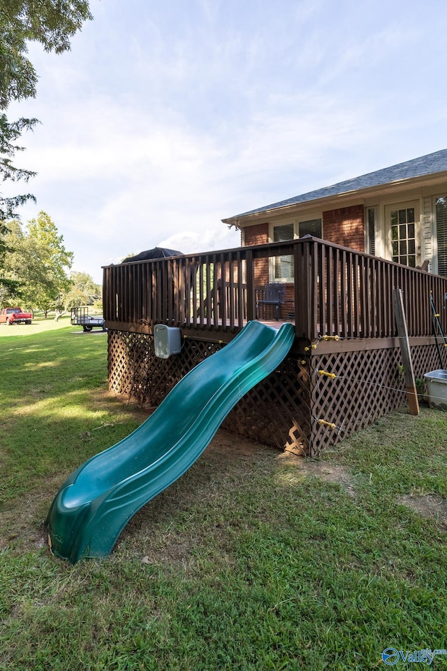 view of jungle gym with a yard