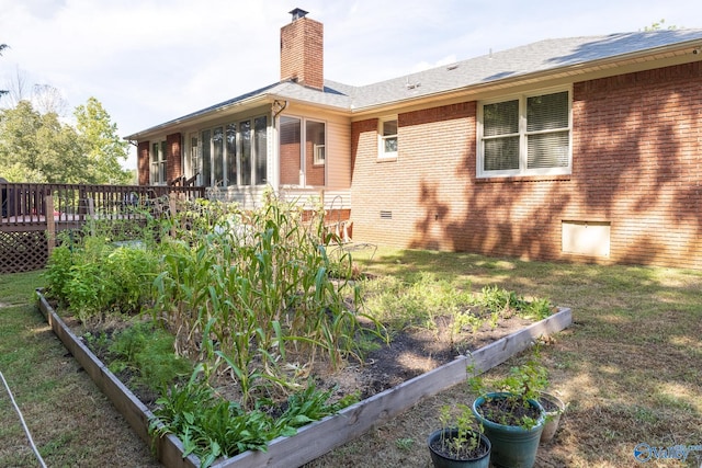 exterior space featuring a wooden deck