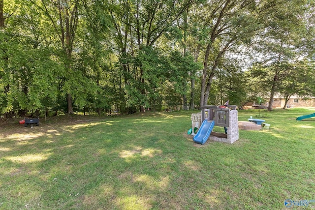 view of yard with a playground