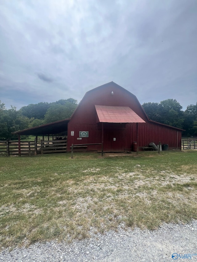 view of stable featuring a rural view