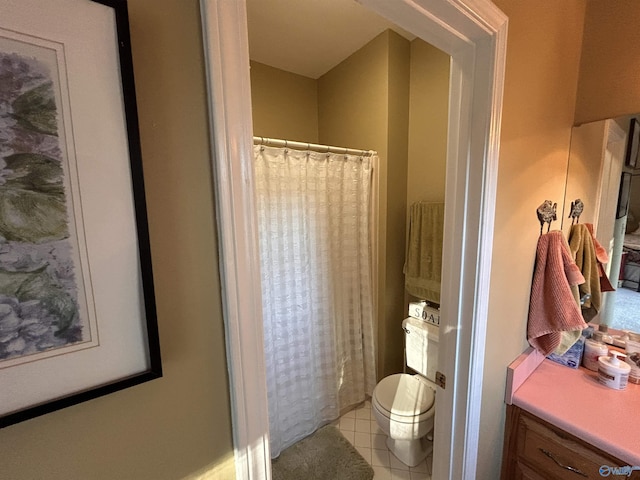 bathroom featuring tile patterned flooring, curtained shower, and toilet