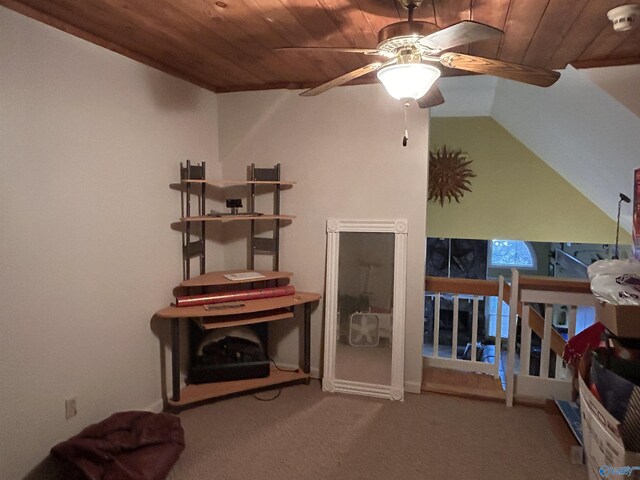 interior space with lofted ceiling, carpet floors, and wooden ceiling