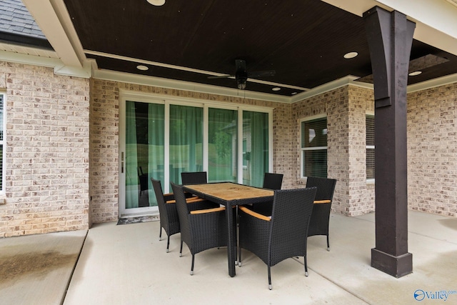 view of patio / terrace featuring ceiling fan and outdoor dining space