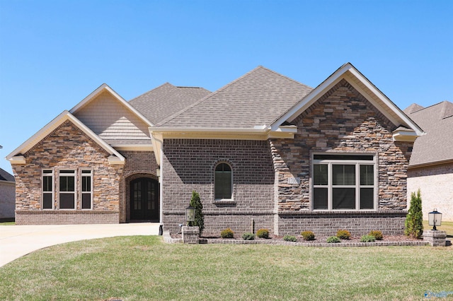 view of front of house featuring french doors and a front lawn