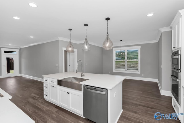 kitchen featuring white cabinets, sink, stainless steel dishwasher, and a kitchen island with sink