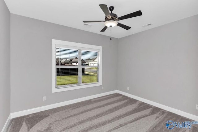 carpeted empty room with ceiling fan