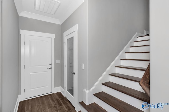 foyer with dark wood-type flooring