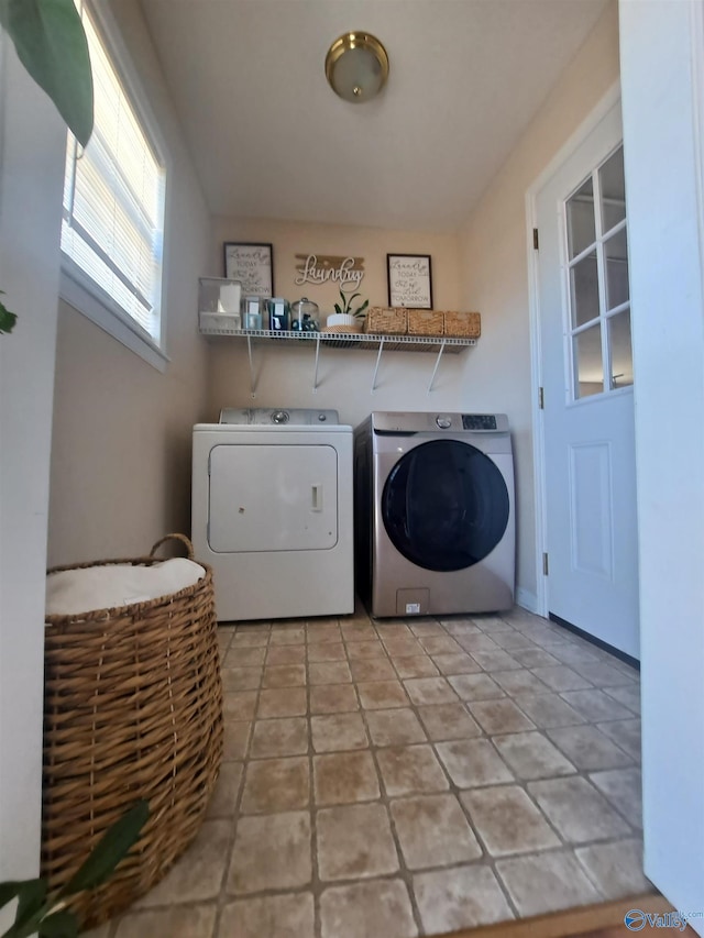 washroom with separate washer and dryer