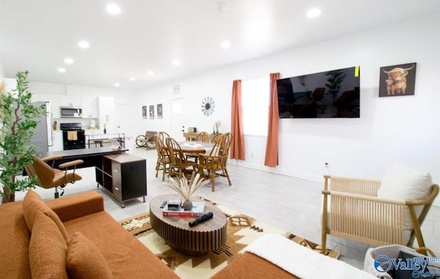 living room featuring recessed lighting and light tile patterned floors