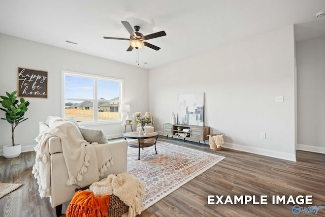 2652 Ajs Arbor Dr NW, Huntsville, AL 35810 - living room featuring wood finished floors, visible vents, a ceiling fan, and baseboards