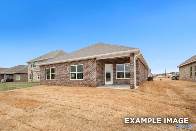2652 Ajs Arbor Dr NW, Huntsville, AL 35810 - rear view of property featuring cooling unit, brick siding, a patio, and a shingled roof
