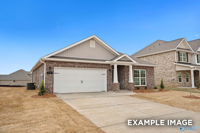 2652 Ajs Arbor Dr NW, Huntsville, AL 35810 - craftsman inspired home with central AC, brick siding, driveway, and a garage