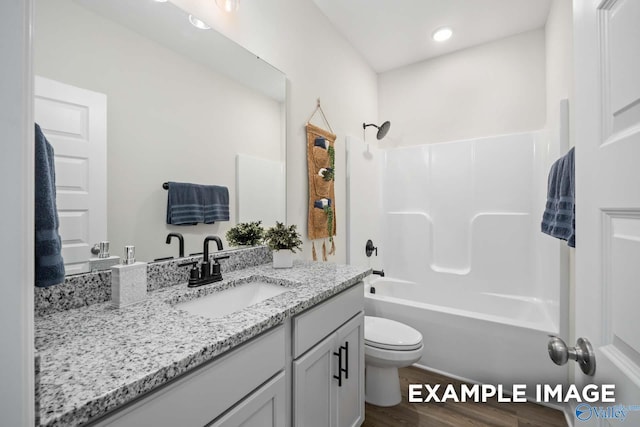 2652 Ajs Arbor Dr NW, Huntsville, AL 35810 - bathroom featuring wood finished floors, bathing tub / shower combination, vanity, toilet, and recessed lighting