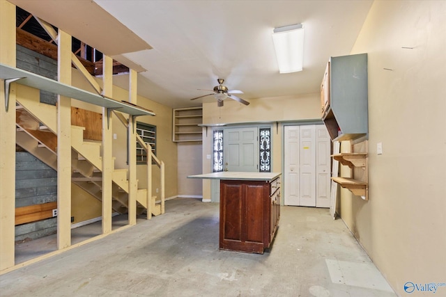 basement with ceiling fan