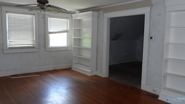 708 E 9th St, Anniston, AL 36207 - unfurnished room featuring a ceiling fan, wood finished floors, and built in shelves