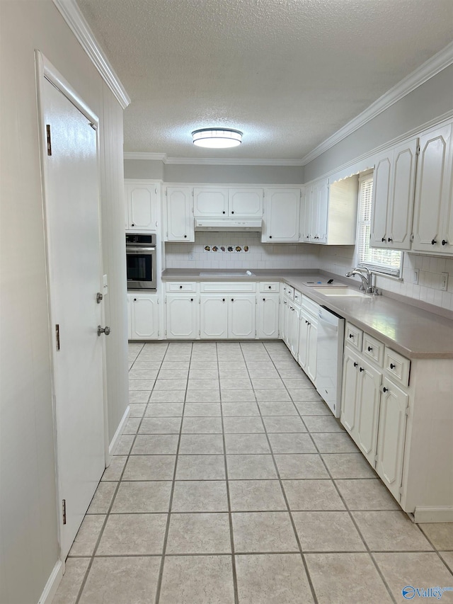 kitchen with sink, white cabinetry, crown molding, dishwasher, and oven