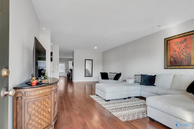 living room with dark wood-type flooring