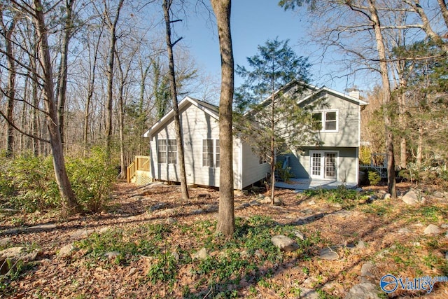 view of home's exterior featuring french doors