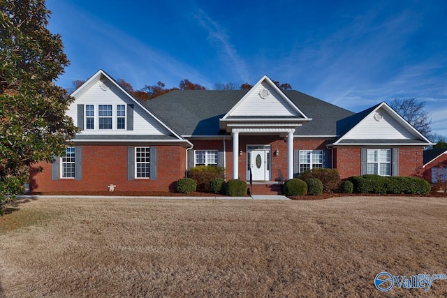 view of front of property with a front lawn