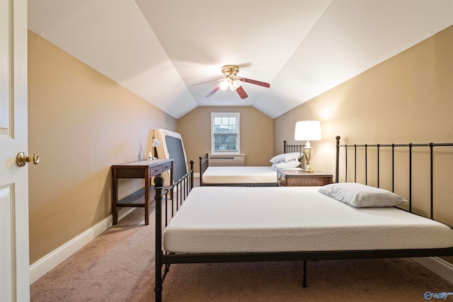 carpeted bedroom featuring lofted ceiling and ceiling fan