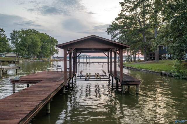 view of dock with a water view