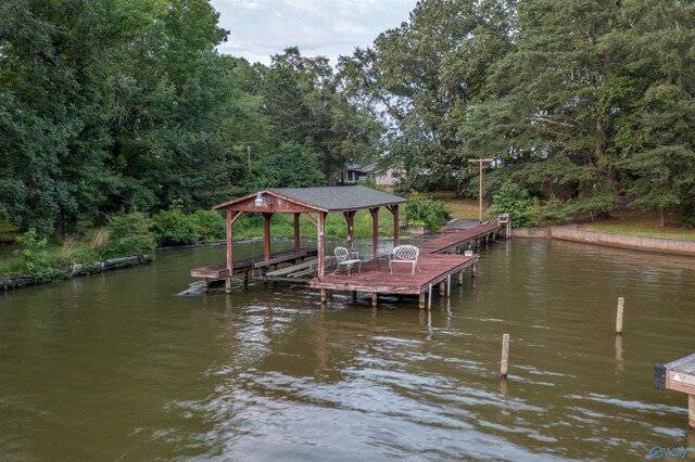 view of dock with a water view