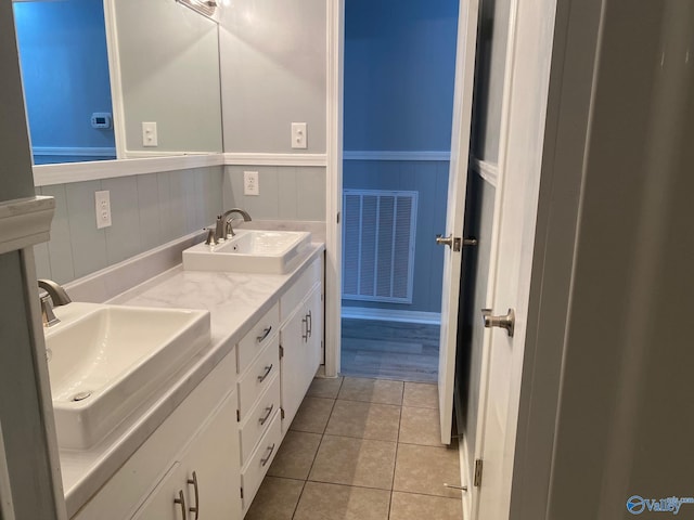 bathroom featuring vanity and tile patterned flooring