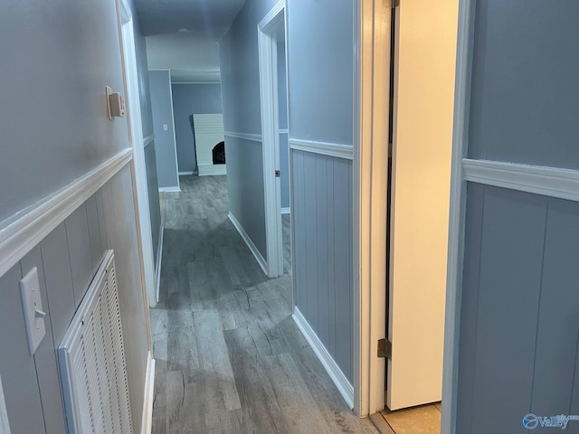 hallway with light wood-type flooring