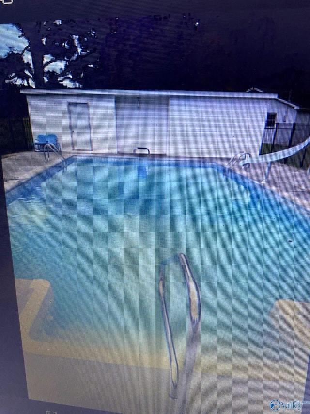 view of pool with central AC