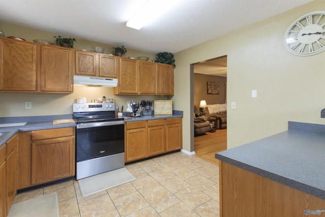 kitchen featuring stainless steel range with electric stovetop