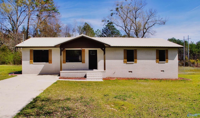 ranch-style house featuring metal roof, crawl space, a front yard, brick siding, and a porch