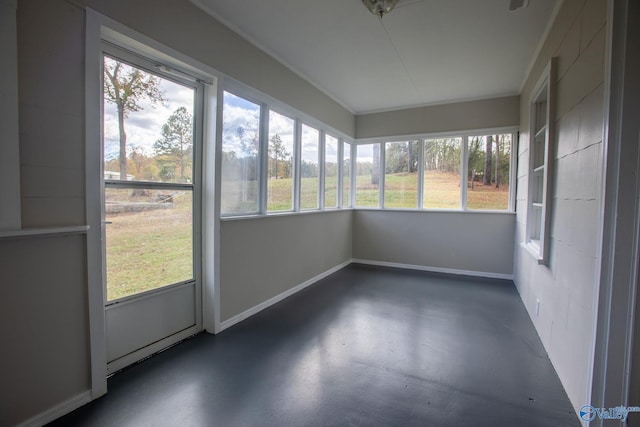 unfurnished sunroom with plenty of natural light