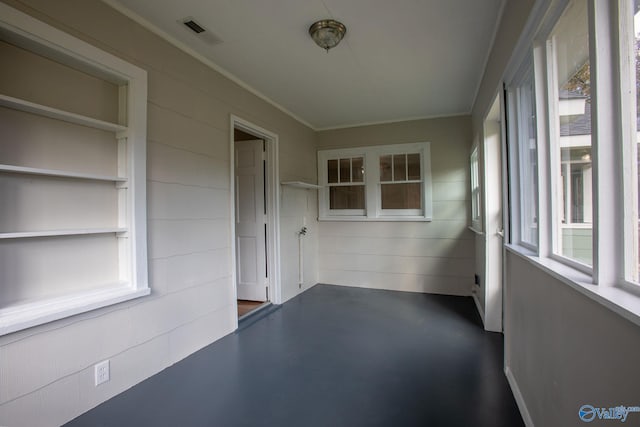 unfurnished sunroom with a healthy amount of sunlight