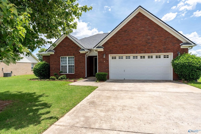 view of front facade featuring a garage, central AC, and a front lawn