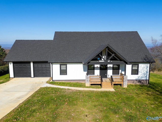 view of front of house with a wooden deck and a front yard