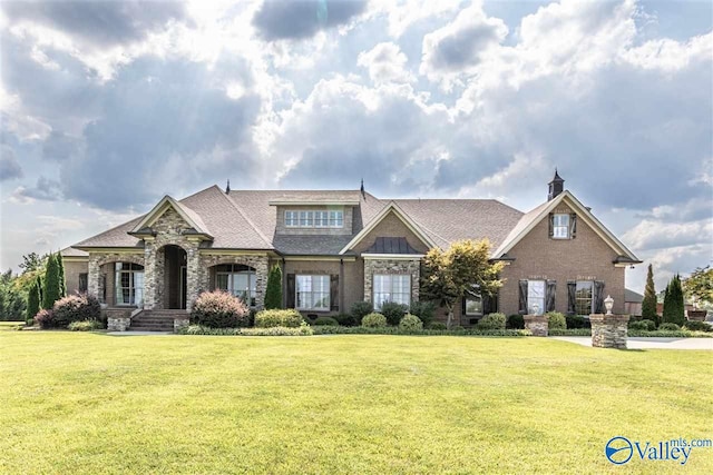 view of front of house with a front yard