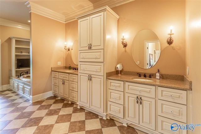 bathroom with baseboards, tile patterned floors, vanity, and crown molding