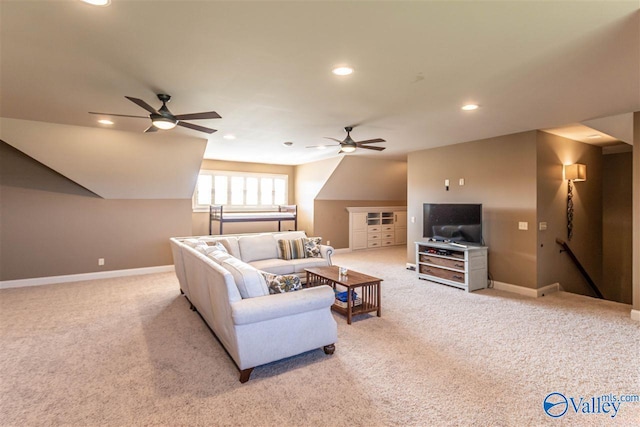 living room featuring recessed lighting, light colored carpet, vaulted ceiling, ceiling fan, and baseboards