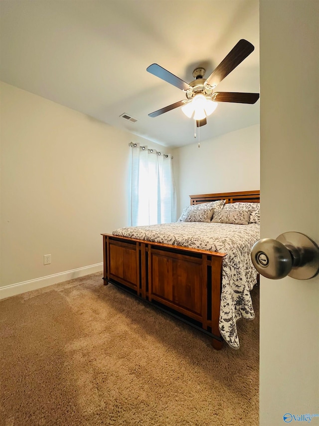 unfurnished bedroom with carpet and ceiling fan