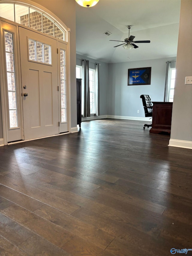 foyer with dark hardwood / wood-style floors, ceiling fan, and plenty of natural light