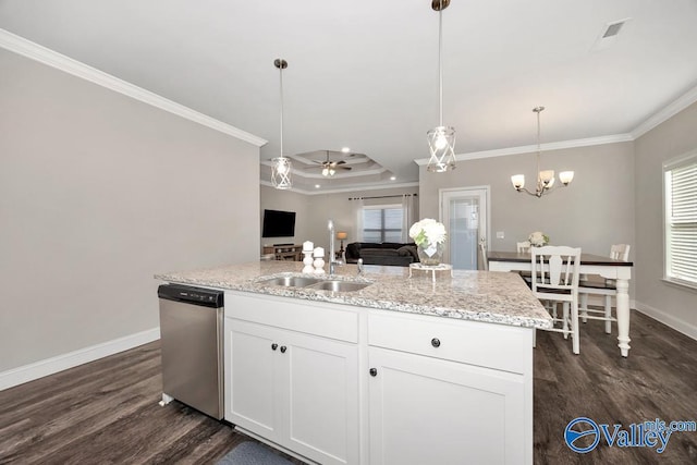 kitchen featuring pendant lighting, stainless steel dishwasher, ornamental molding, white cabinetry, and a sink