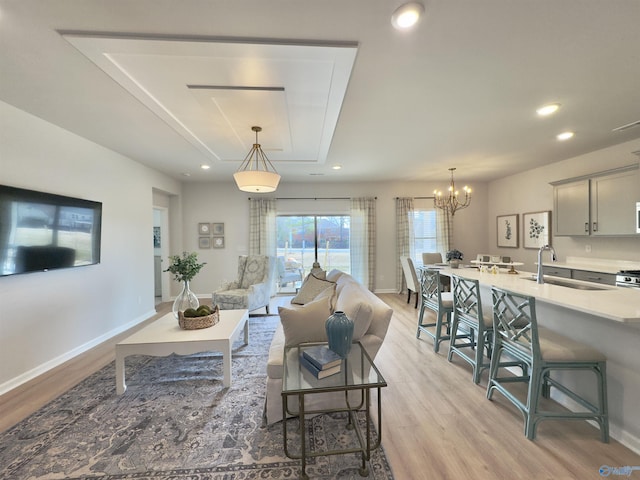 211 Shangrila Way, Meridianville, AL 35759 - living area with light wood-style floors, recessed lighting, baseboards, and a chandelier