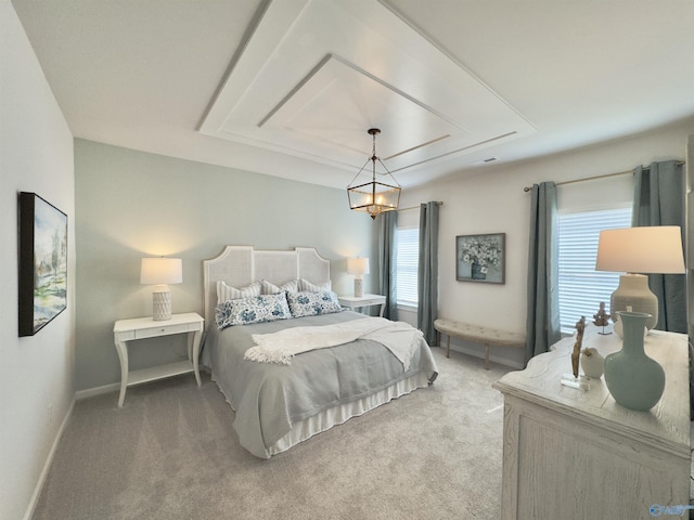 211 Shangrila Way, Meridianville, AL 35759 - carpeted bedroom featuring baseboards, a raised ceiling, and a chandelier