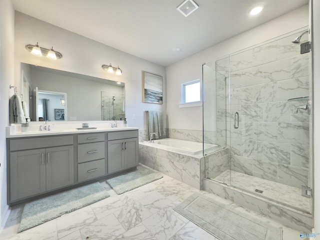 211 Shangrila Way, Meridianville, AL 35759 - full bath featuring marble finish flooring, a shower stall, a bath, double vanity, and recessed lighting
